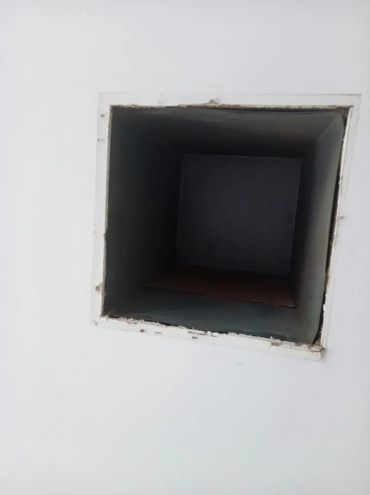 Open air-con vent hole in an Epsom ceiling