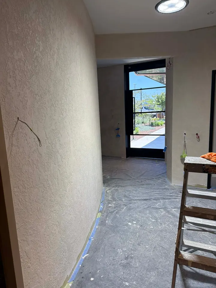 Waiting room wall finished in Venetian plaster